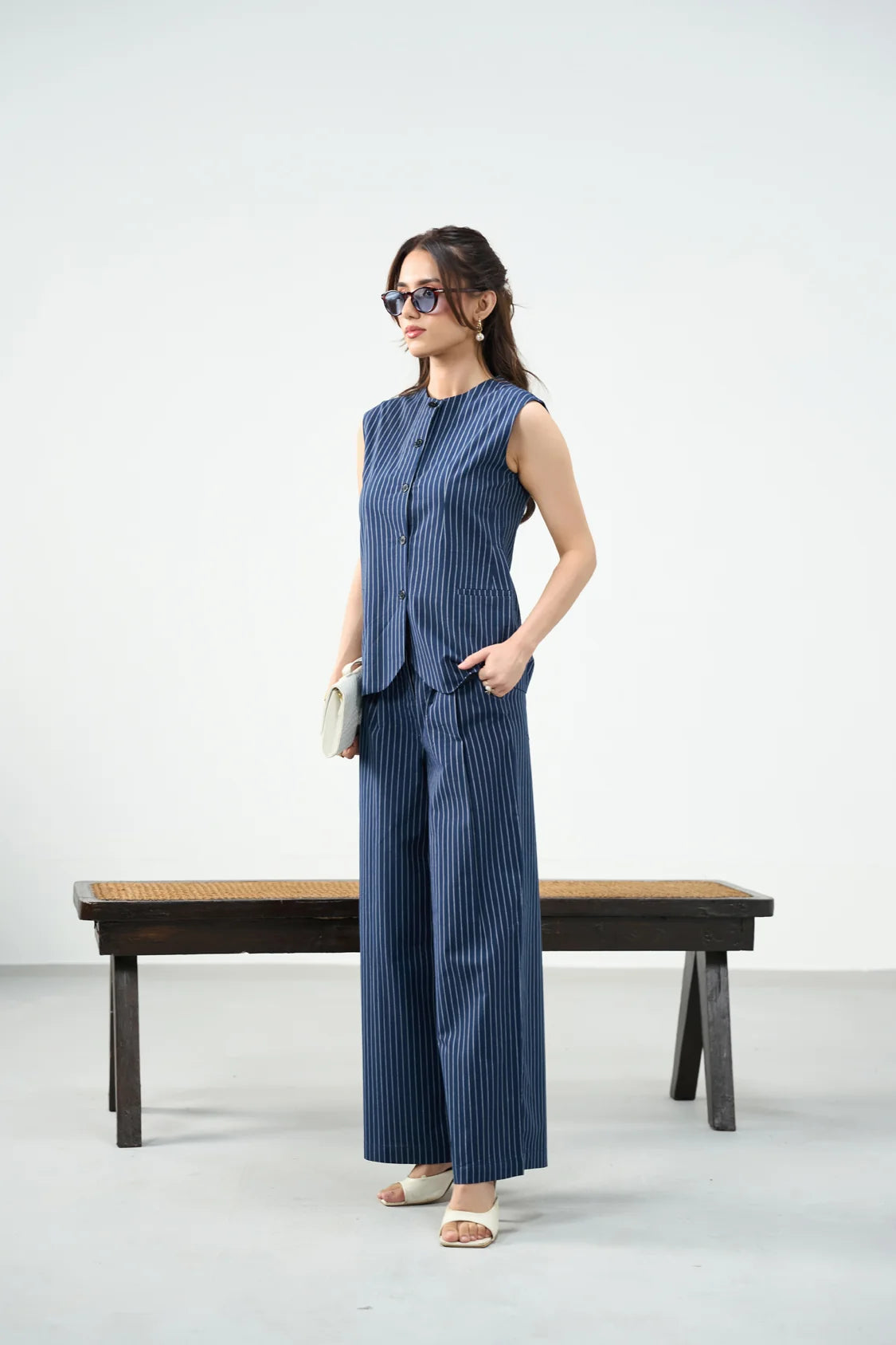 Material & Fit: Cotton woven fabric | Regular fit Suitable for: Smart casual & occasion wear  Details:  Round neckline with button placket Sleeveless design Side pockets Matching wide-leg pinstriped pants Sizing: Model is 5'4", and wearing a size 'XS'.