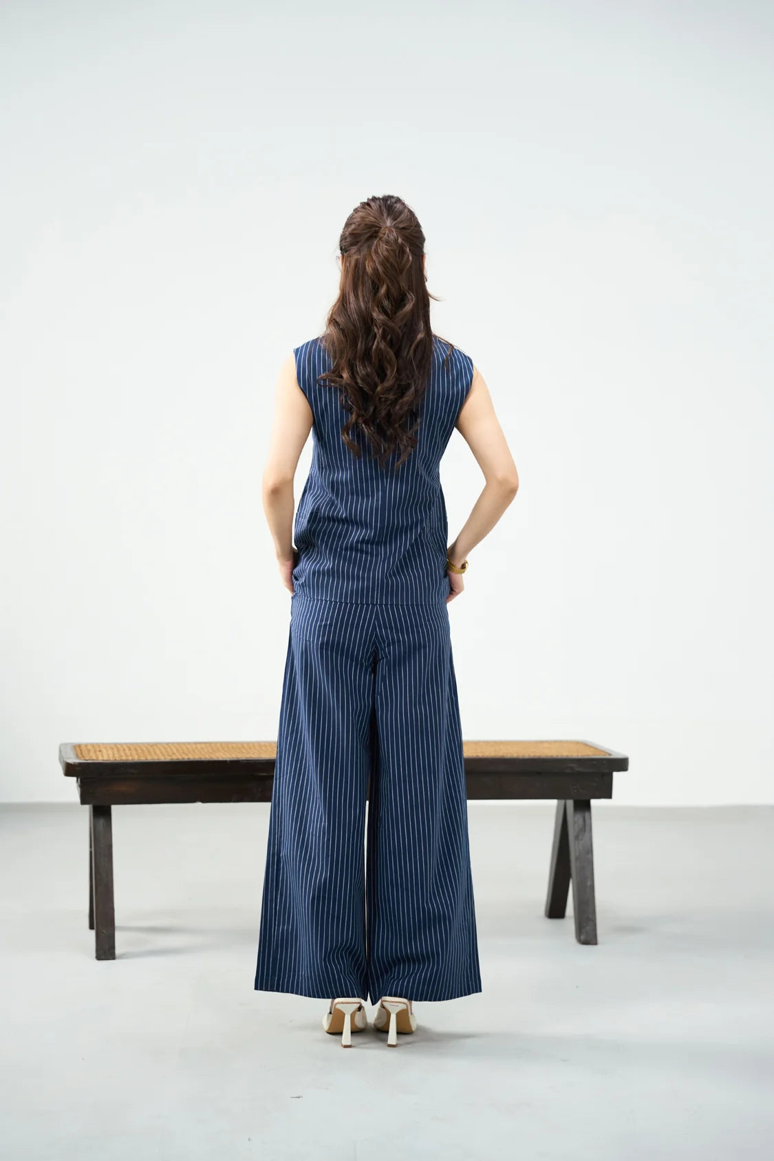 Material & Fit: Cotton woven fabric | Regular fit Suitable for: Smart casual & occasion wear  Details:  Round neckline with button placket Sleeveless design Side pockets Matching wide-leg pinstriped pants Sizing: Model is 5'4", and wearing a size 'XS'.
