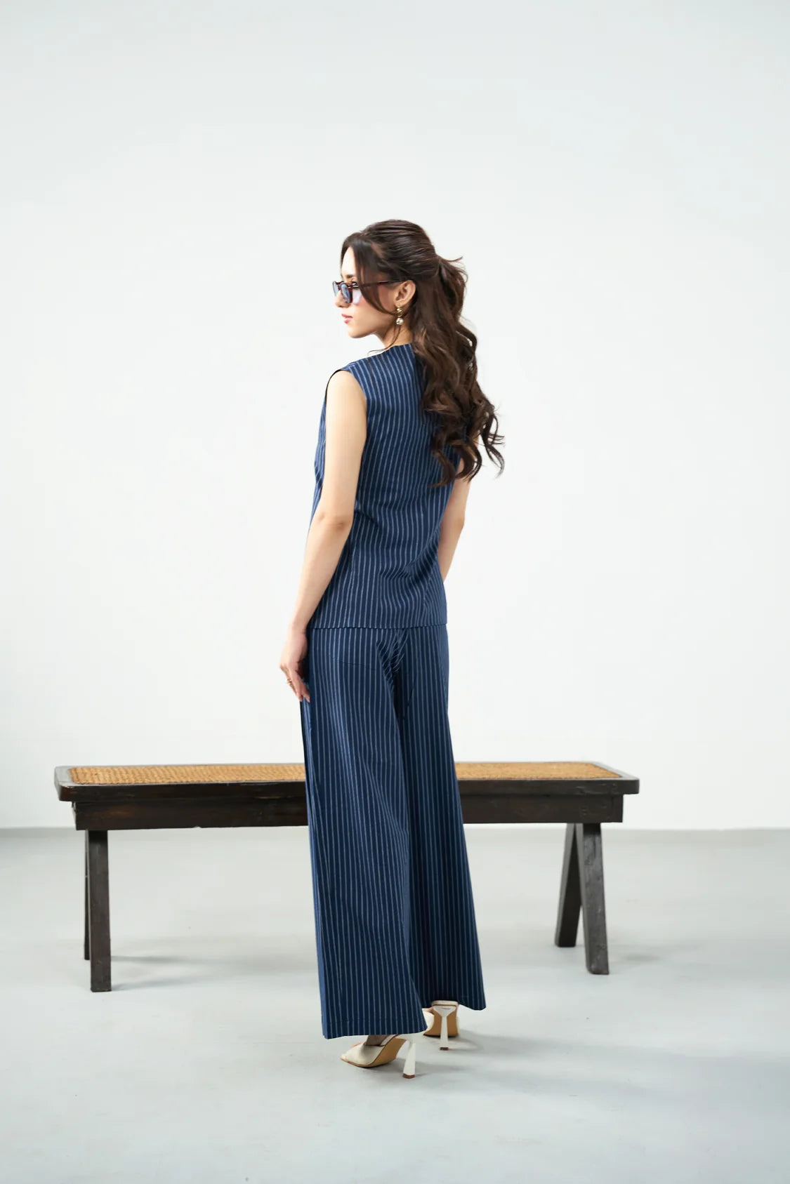 Material & Fit: Cotton woven fabric | Regular fit Suitable for: Smart casual & occasion wear  Details:  Round neckline with button placket Sleeveless design Side pockets Matching wide-leg pinstriped pants Sizing: Model is 5'4", and wearing a size 'XS'.