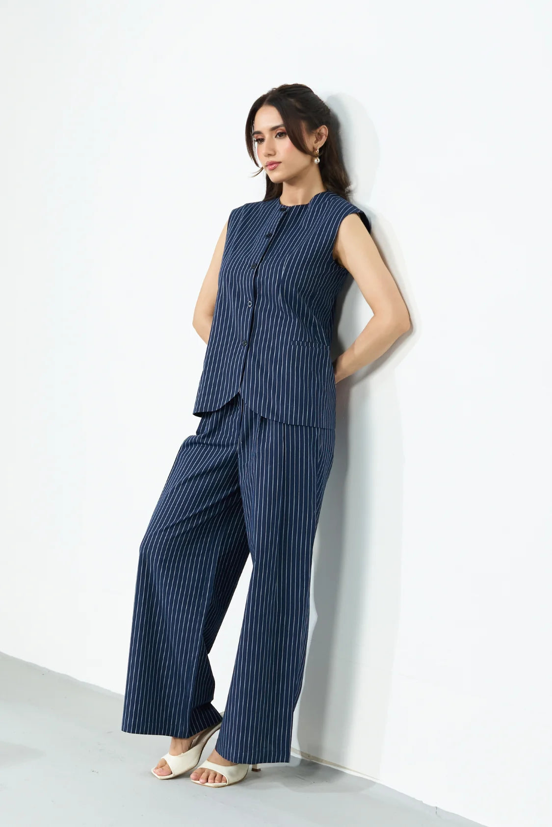 Material & Fit: Cotton woven fabric | Regular fit Suitable for: Smart casual & occasion wear  Details:  Round neckline with button placket Sleeveless design Side pockets Matching wide-leg pinstriped pants Sizing: Model is 5'4", and wearing a size 'XS'.
